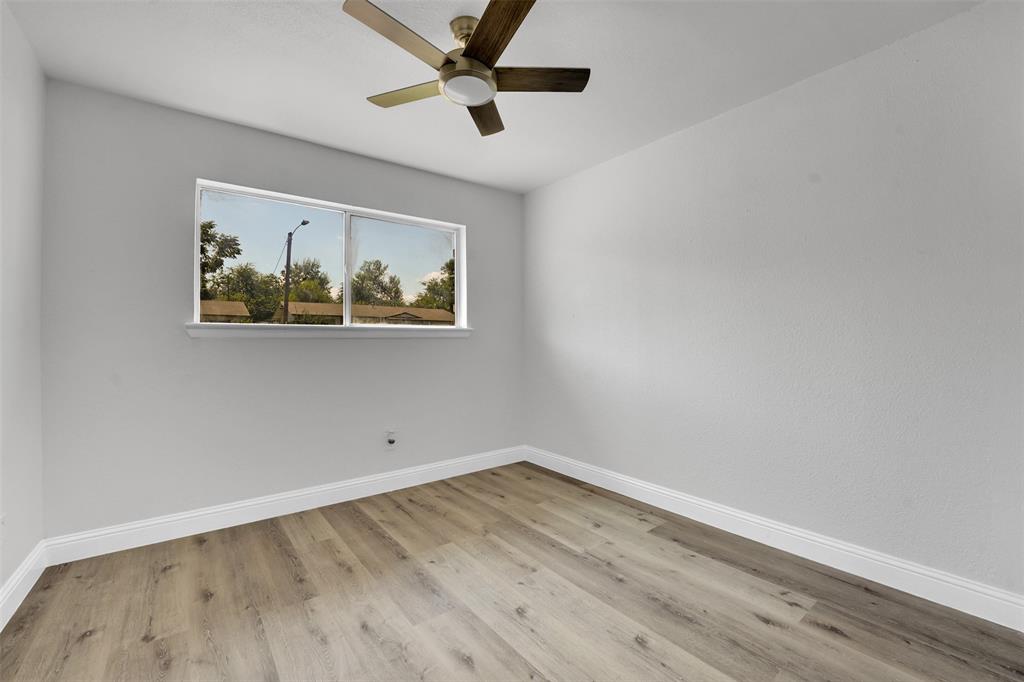 1507 East Lovers Lane Arlington, TX 76010 - Photo 12 of 18 a view of empty room with wooden floor