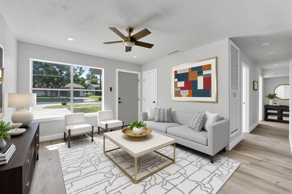 1507 East Lovers Lane Arlington, TX 76010 - Photo 2 of 18 a living room with furniture and a large window