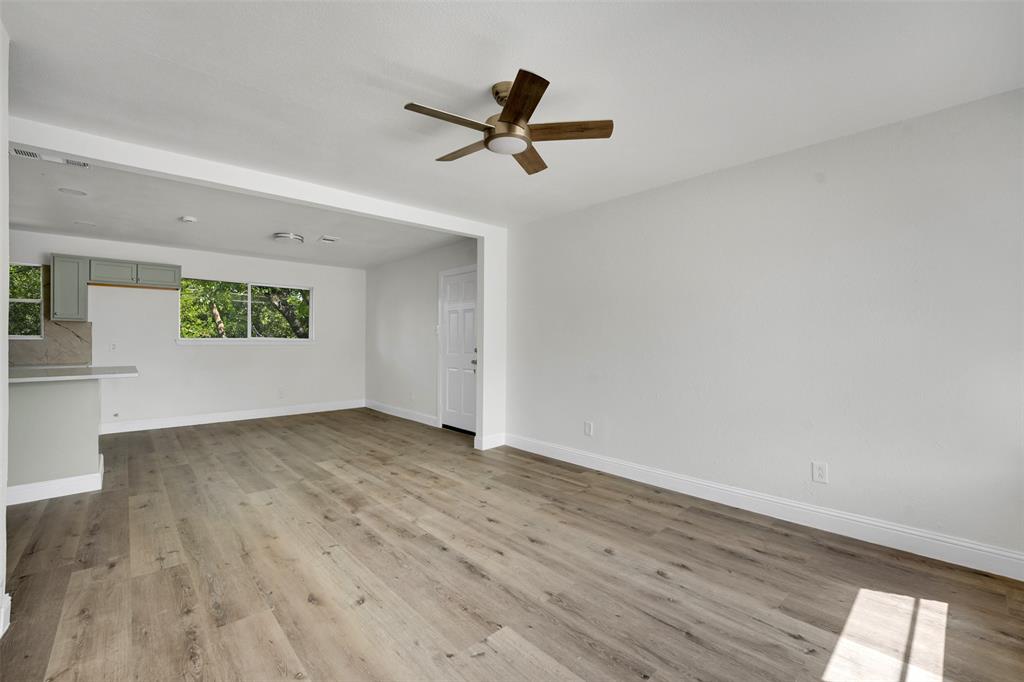 1507 East Lovers Lane Arlington, TX 76010 - Photo 5 of 18 a view of empty room with wooden floor and fan