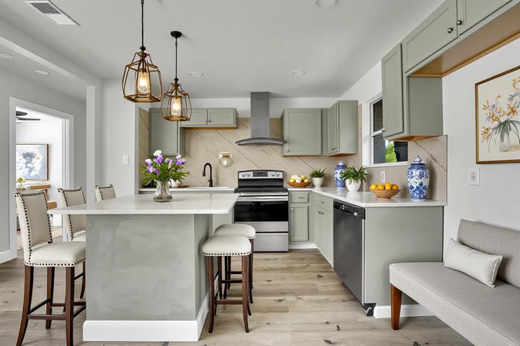 1507 East Lovers Lane Arlington, TX 76010 - Photo 7 of 18 a kitchen with a table and chairs in it