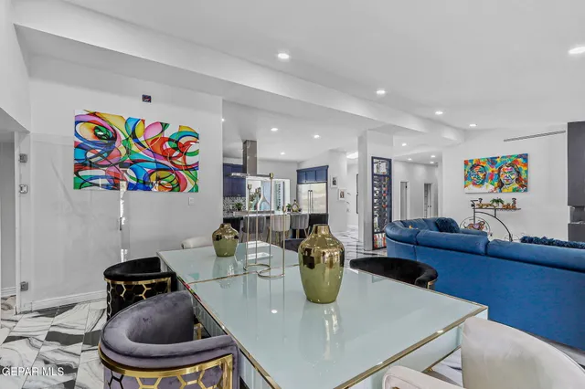 a view of a dining room with furniture window and outside view