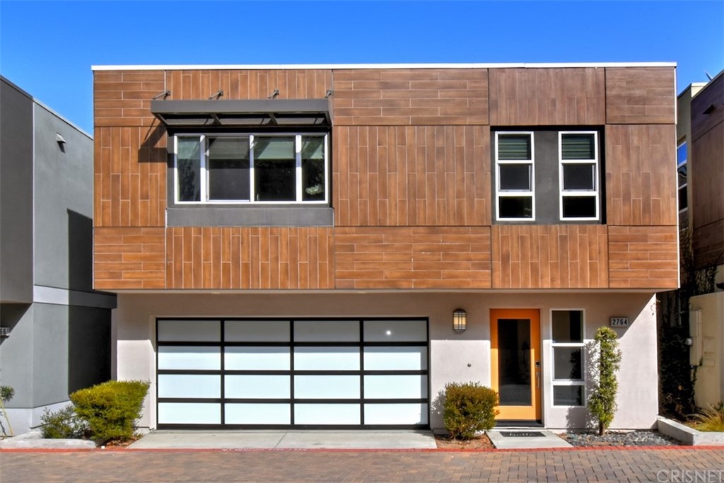 a front view of a building with glass windows