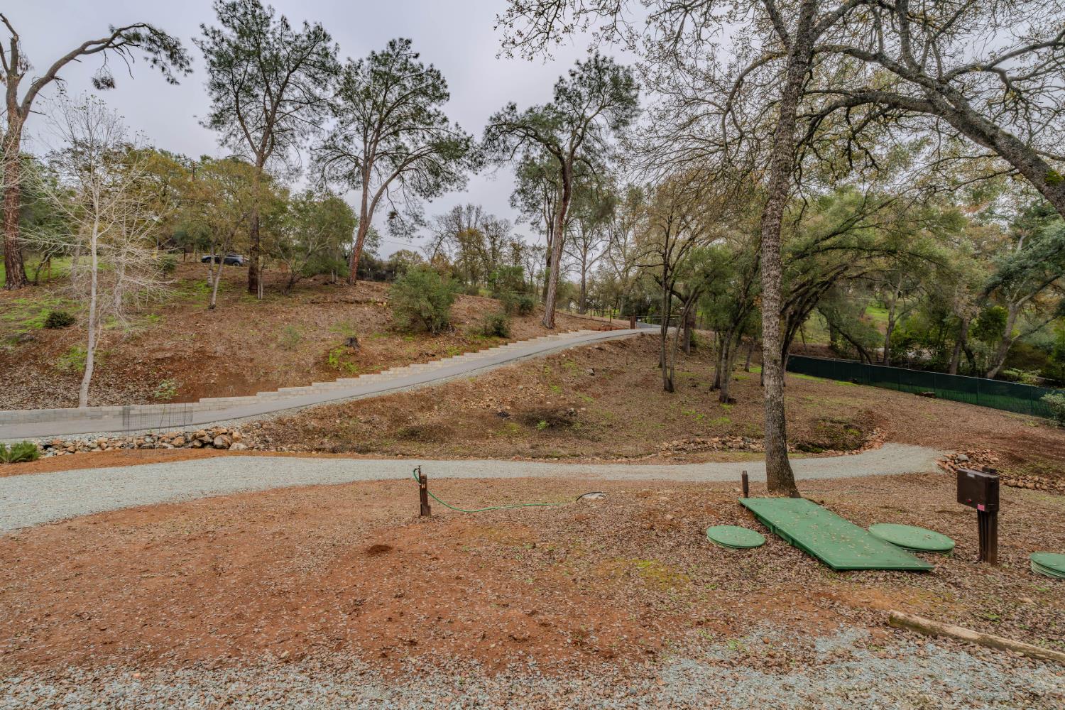 7126 Westhill Road Valley Springs, CA 95252 - Photo 14 of 30 a backyard of a house with lots of green space