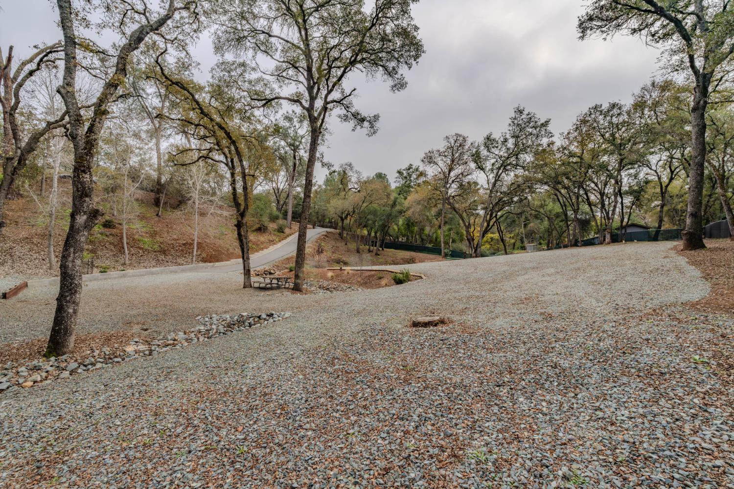7126 Westhill Road Valley Springs, CA 95252 - Photo 7 of 30 a view of road with trees in the background