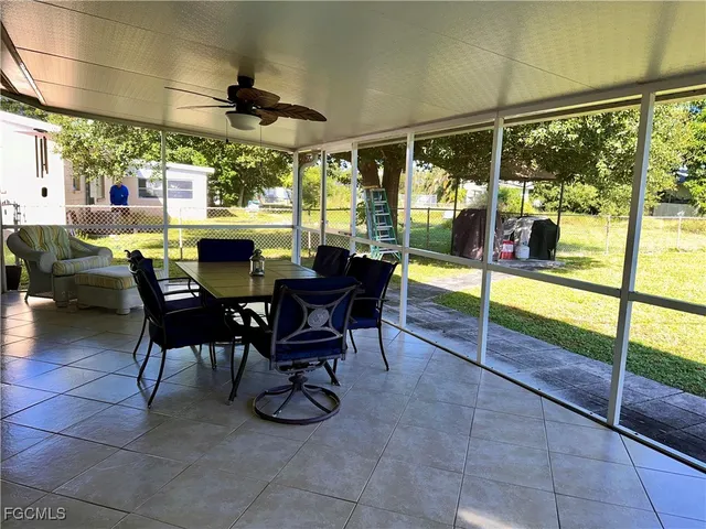 a view of a house with a big yard