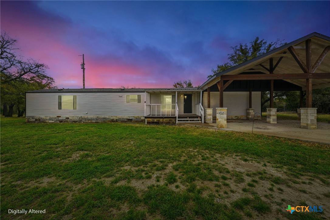 770 Private Road 3447 Kempner, TX 76539 - Photo 1 of 34 a front view of a house with garden