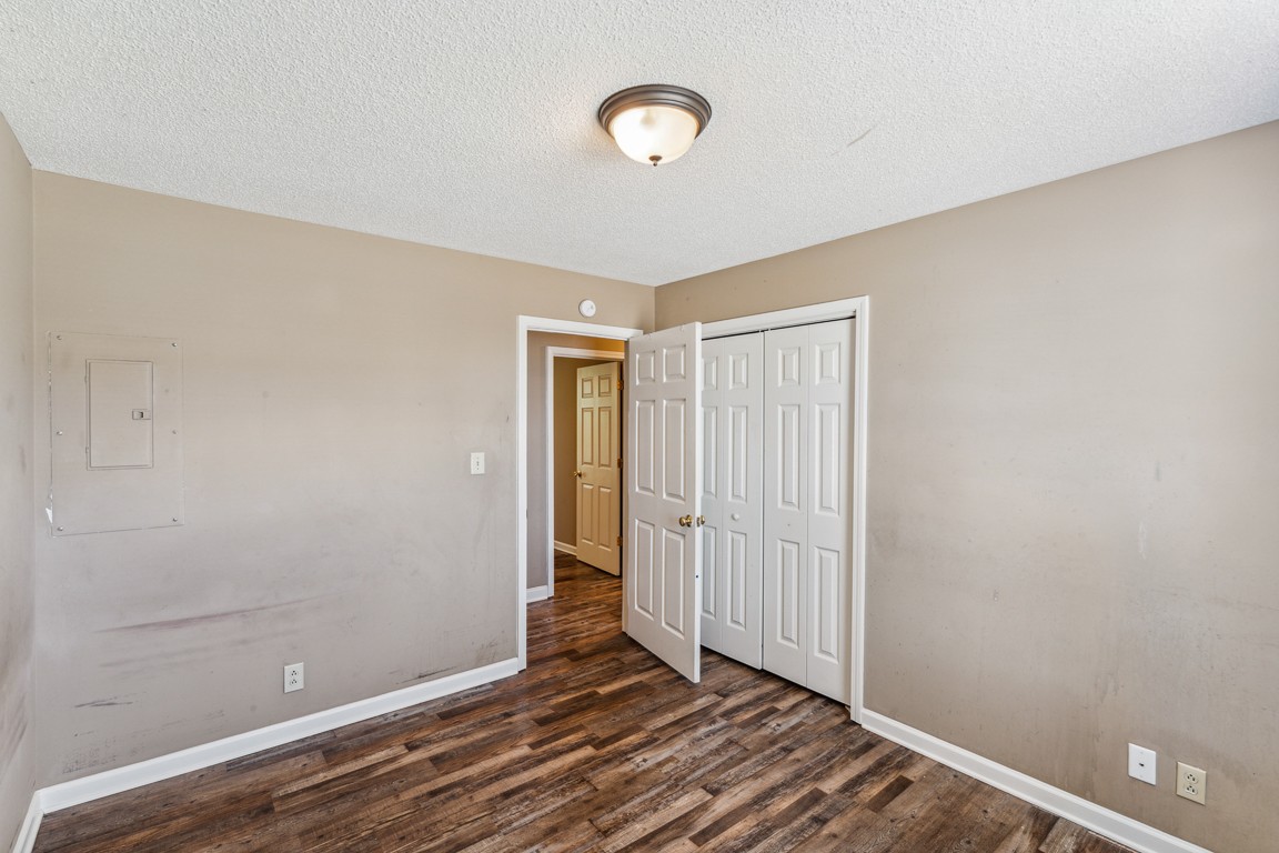771 Needmore Road Clarksville, TN 37040 - Photo 10 of 15 a view of an empty room with wooden floor