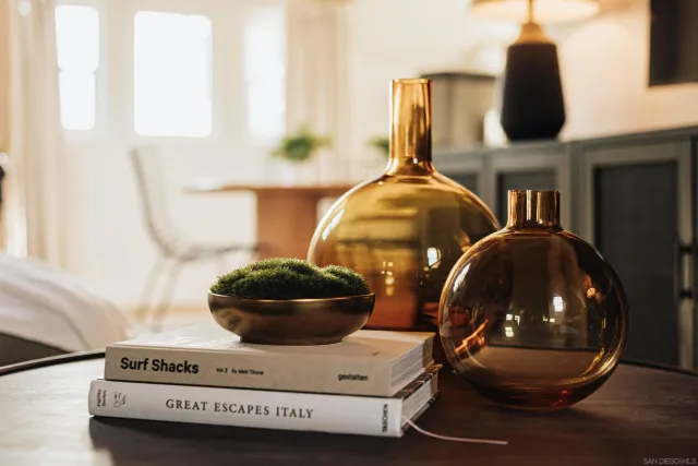 a bedroom with a bed and a mirror