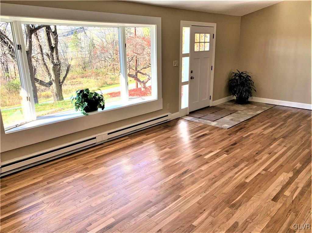 2521 Ringhoffer Road Hellertown, PA 18055 - Photo 3 of 35 Living Room with gorgeous hardwood floors.