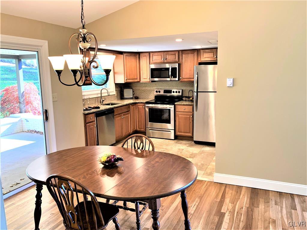 2521 Ringhoffer Road Hellertown, PA 18055 - Photo 4 of 35 Dining Room with door to covered patio, hardwood f