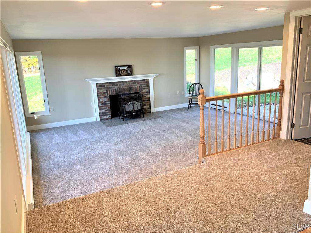 2521 Ringhoffer Road Hellertown, PA 18055 - Photo 6 of 35 First floor family room with door to patio, brand