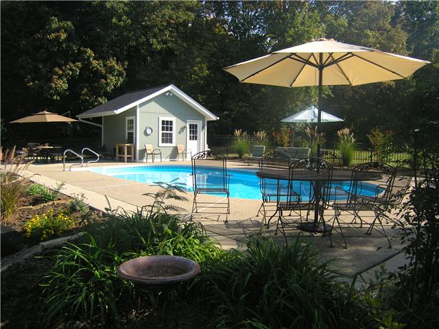 562 Natchez Bend Road Nashville, TN 37221 - Photo 3 of 20 Well maintained Pool and pool house, wrought iron fences and landscape recently installed