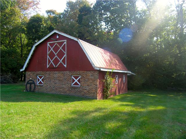 562 Natchez Bend Road Nashville, TN 37221 - Photo 5 of 20 3 Stall Barn with extra Storage above, Room inside and covered area outside for tools and equipment