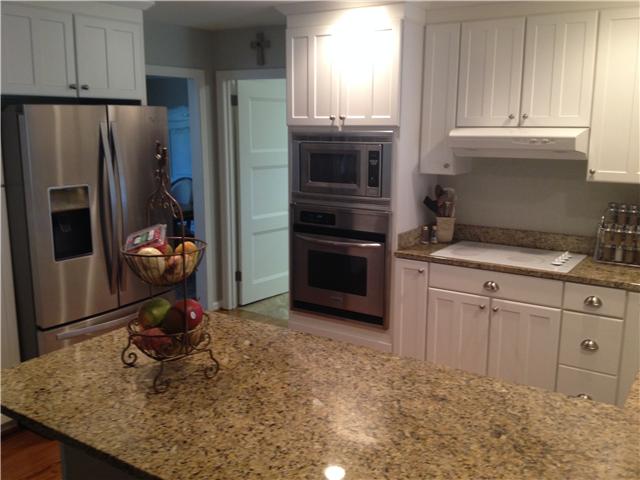 562 Natchez Bend Road Nashville, TN 37221 - Photo 9 of 20 Cabinets above and below recently equipped with rolling pullouts. New Stainless Steel Refrigerator remains with the Home.