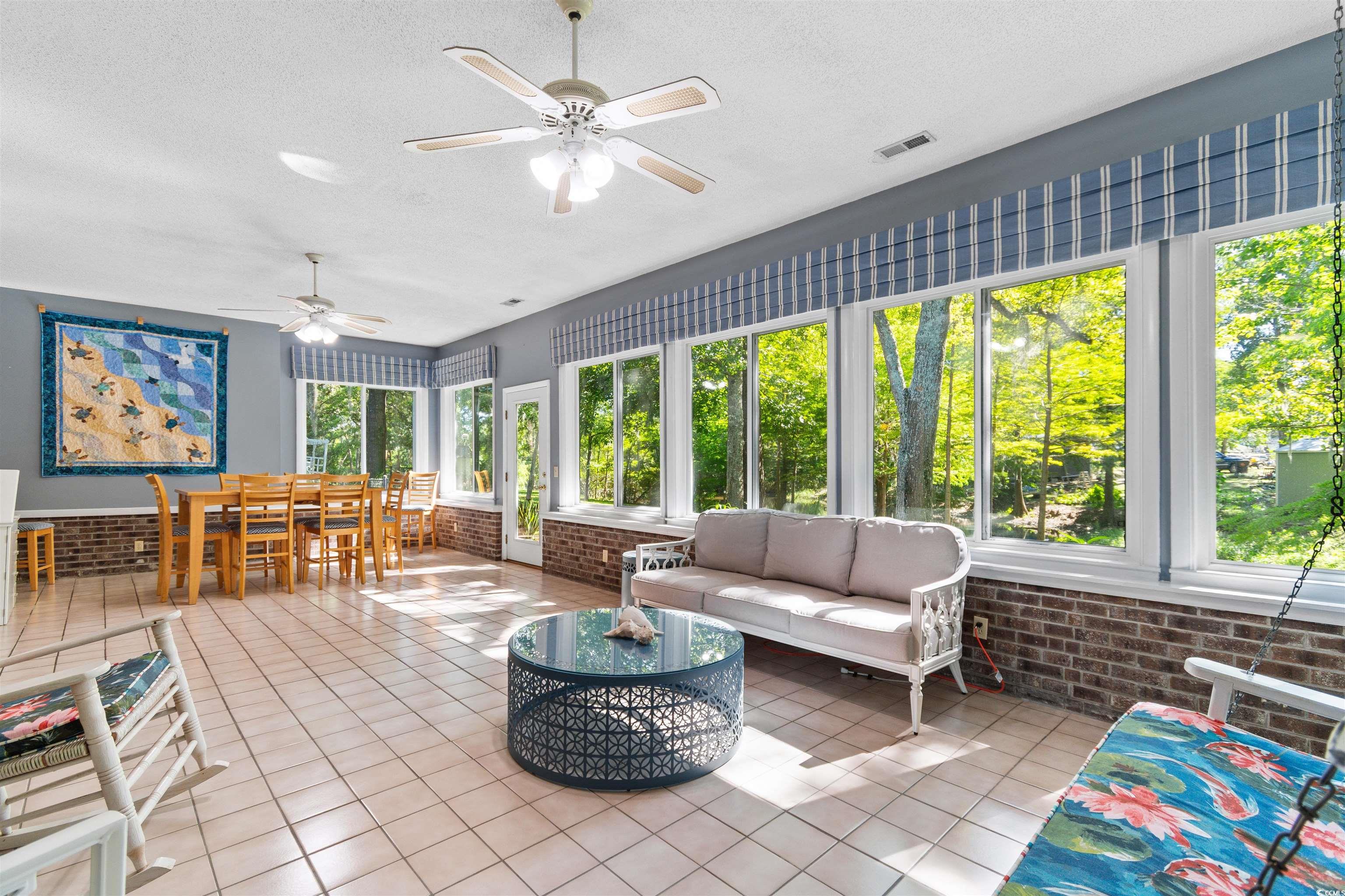 814 2nd Avenue Georgetown, SC 29440 - Photo 26 of 39 Bathroom featuring shower / bath combination and wood finished floors