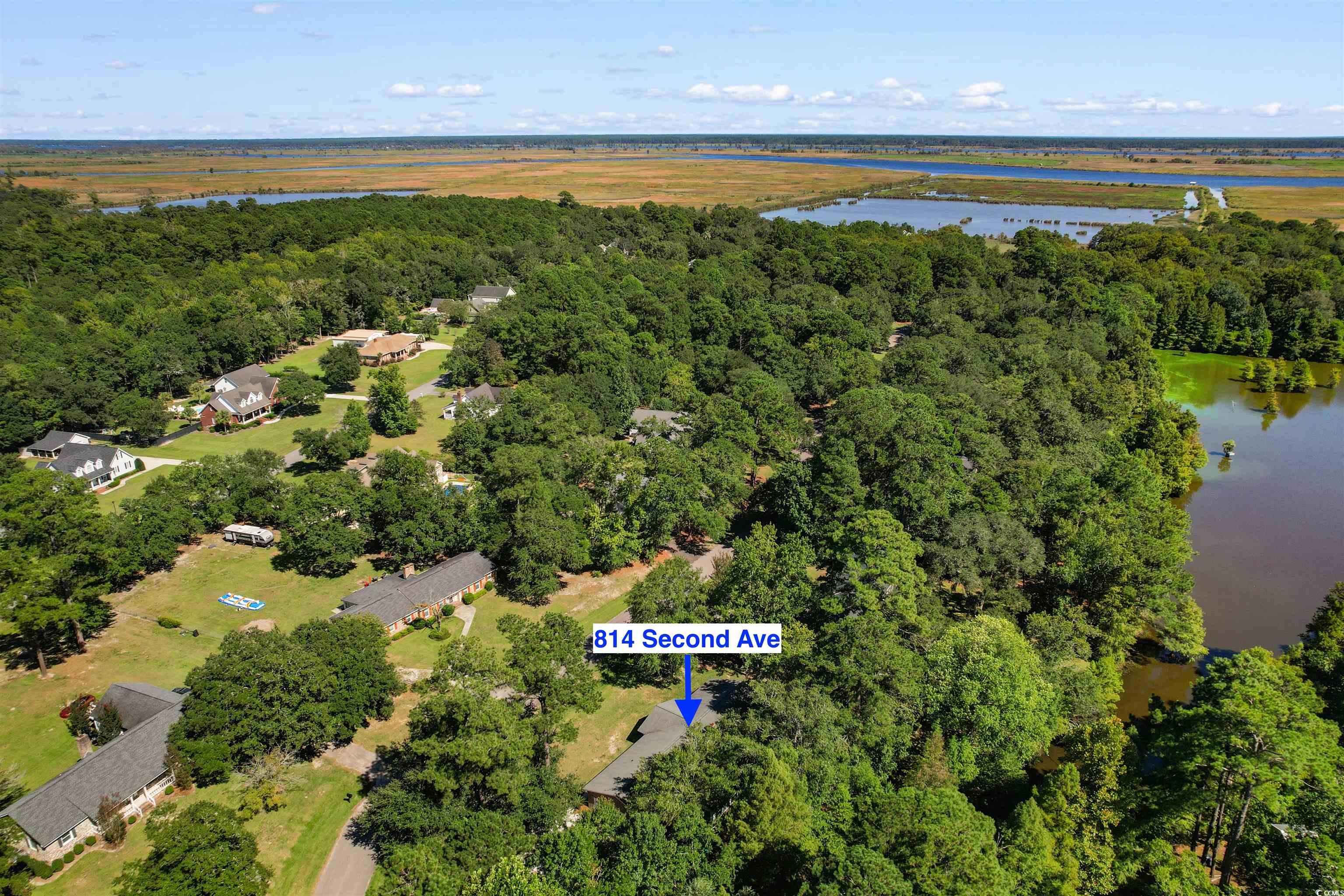 814 2nd Avenue Georgetown, SC 29440 - Photo 36 of 39 Bird's eye view of a nearby body of water and a heavily wooded area