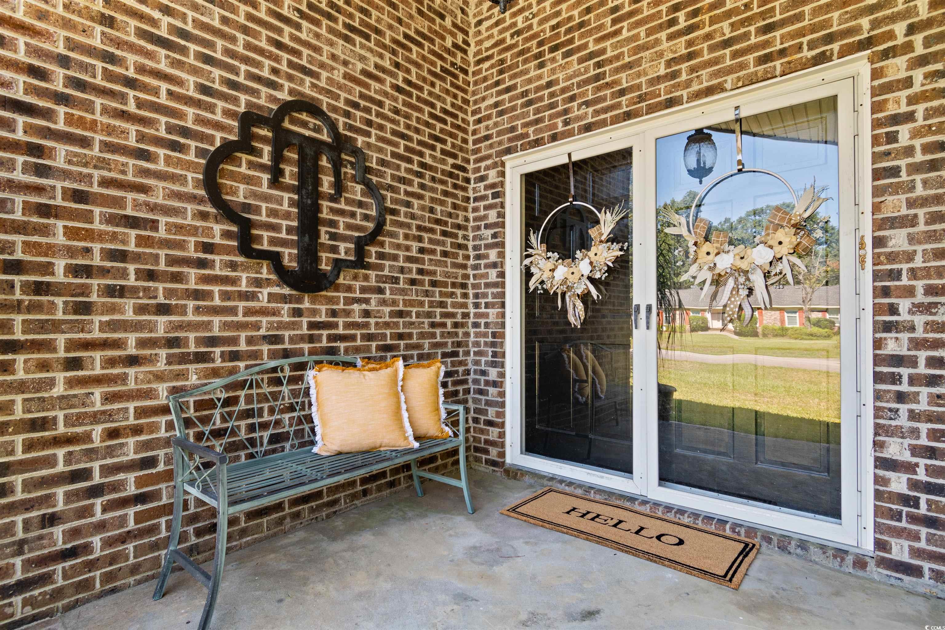 814 2nd Avenue Georgetown, SC 29440 - Photo 4 of 39 View of exterior entry with brick siding