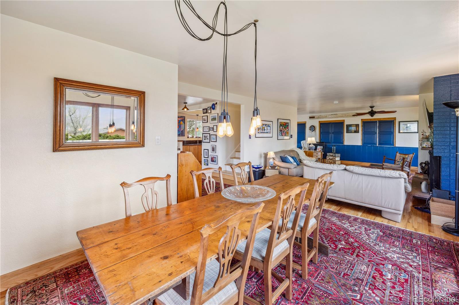 1069 Crestmoor Drive Boulder, CO 80303 - Photo 11 of 45 a dining room with furniture and wooden floor