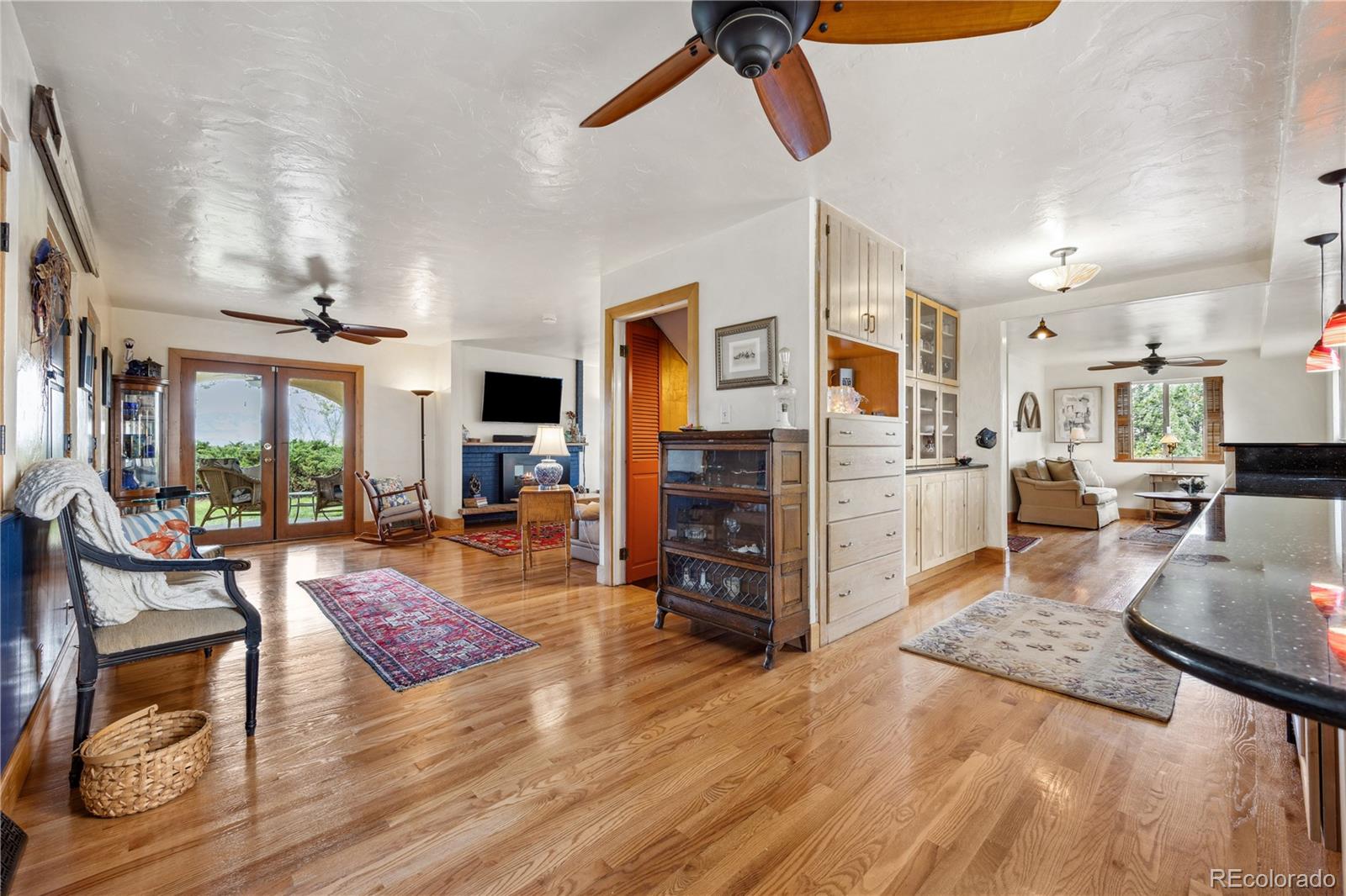 1069 Crestmoor Drive Boulder, CO 80303 - Photo 13 of 45 a living room with furniture and a flat screen tv