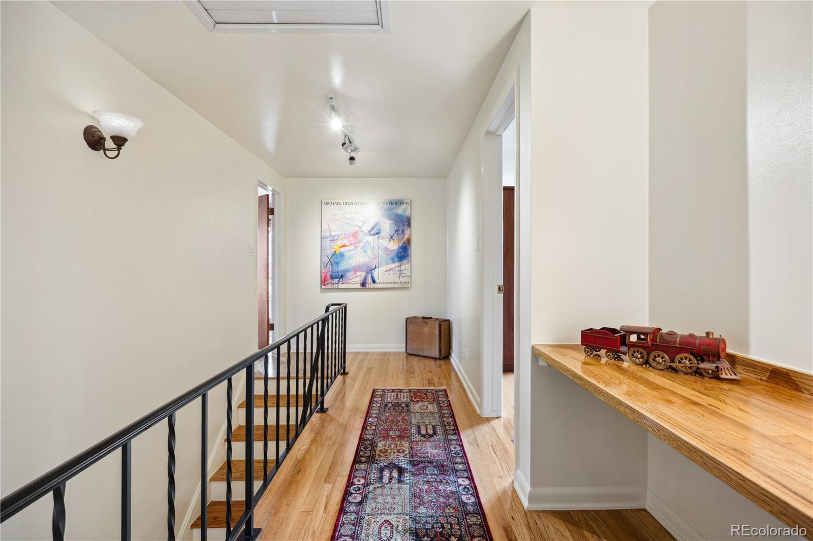 1069 Crestmoor Drive Boulder, CO 80303 - Photo 15 of 45 a hallway with wooden floor