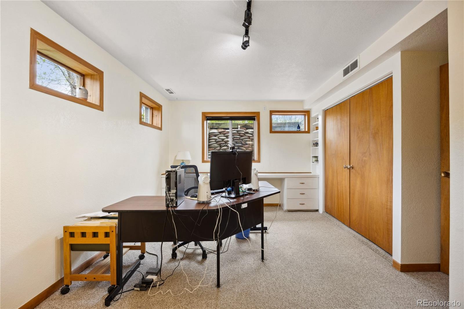 1069 Crestmoor Drive Boulder, CO 80303 - Photo 23 of 45 a view of a workspace with furniture