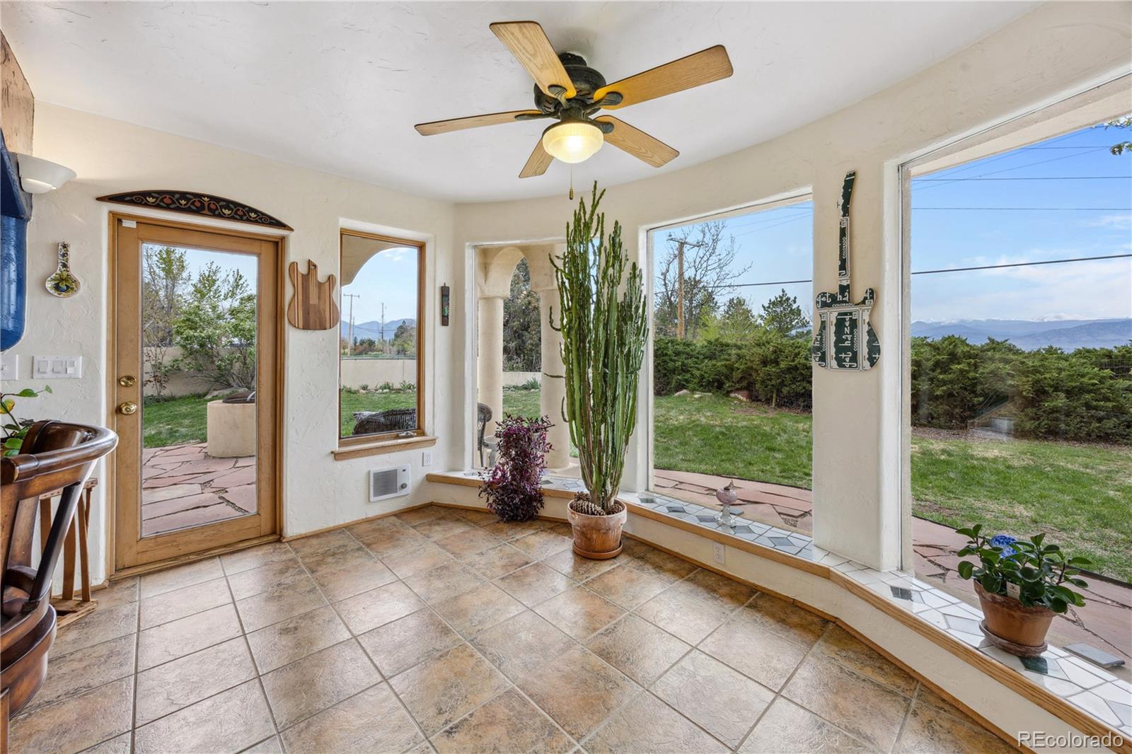 1069 Crestmoor Drive Boulder, CO 80303 - Photo 4 of 45 a living room with hardwood floor and a floor to ceiling window