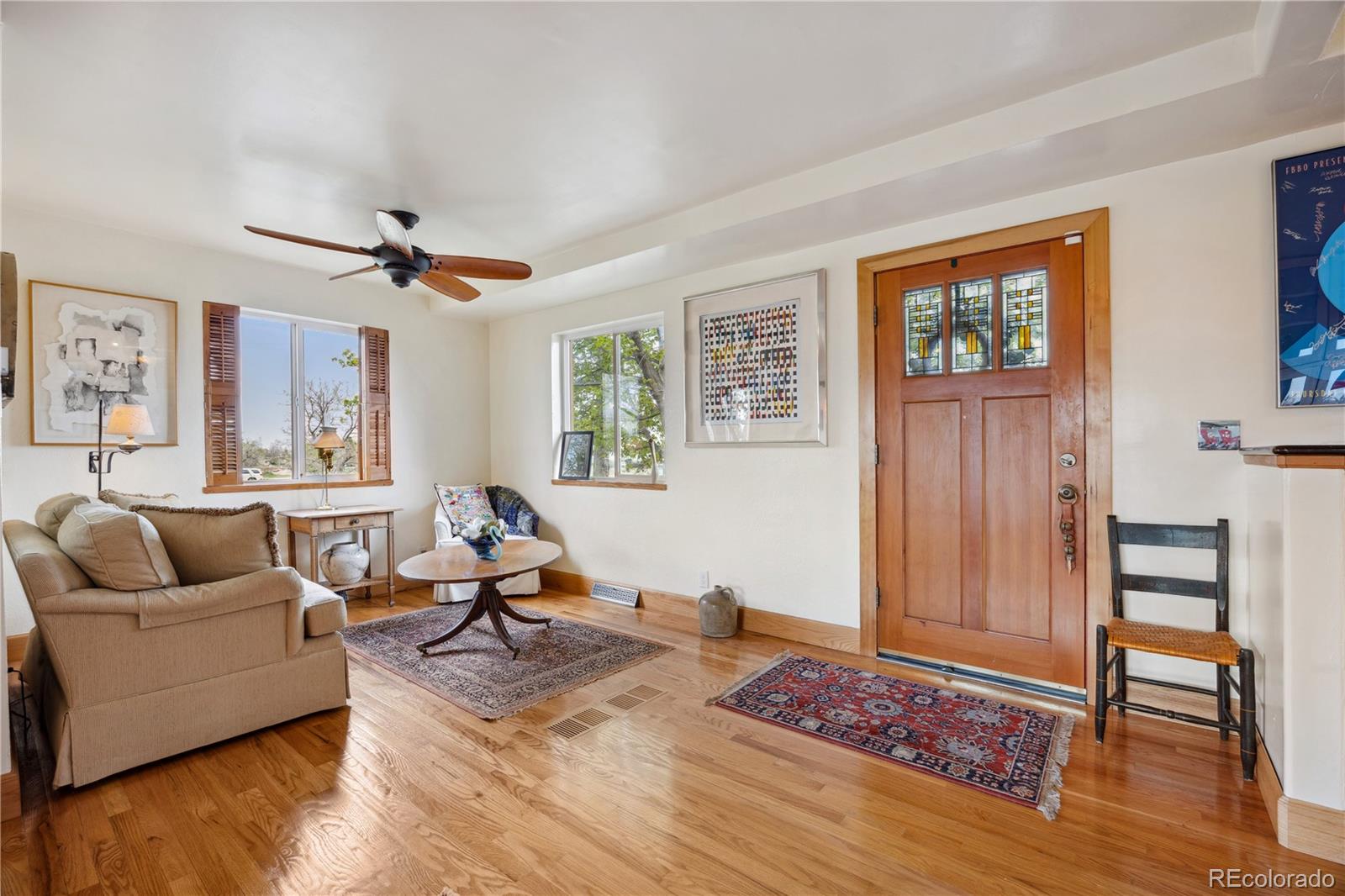1069 Crestmoor Drive Boulder, CO 80303 - Photo 10 of 45 a living room with furniture and a wooden floor