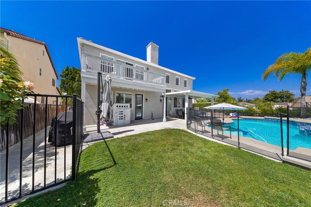 32985 Novara Court Temecula, CA 92592 - Photo 10 of 56 Expansive Backyard With Sparkling Pool, Spa, And Large Entertaining Space