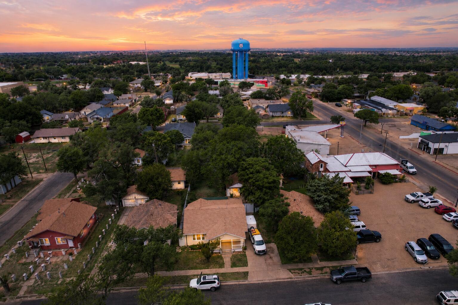 606 South Prospect Street Amarillo, TX 79106 - Photo 3 of 22 an aerial view of a city with lots of residential buildings ocean and mountain view in back