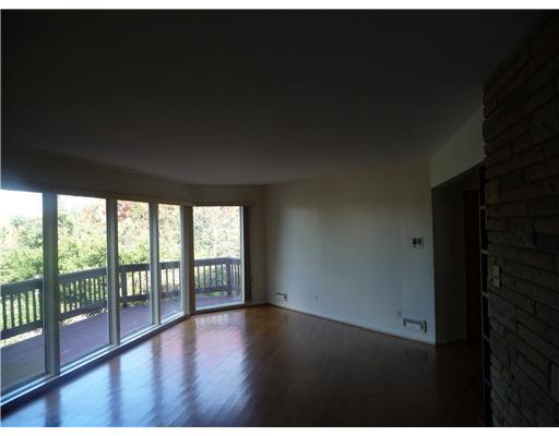 701 Pinoak Road Mt. Lebanon, PA 15243 - Photo 5 of 11 Living Room. large deck attached off of living and dining room. Bright, open and spacious first floor plan. Private backyard.