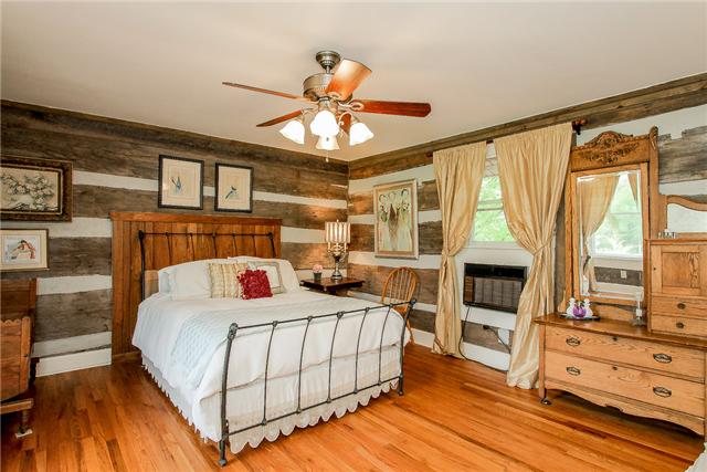 2281 Osburn Road Arrington, TN 37014 - Photo 11 of 20 a bedroom with a bed and a flat tv screen on dresser