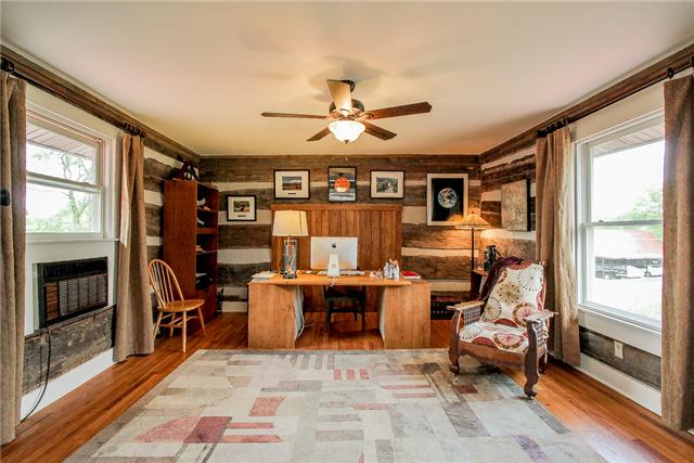 2281 Osburn Road Arrington, TN 37014 - Photo 12 of 20 a living room with furniture a window and a fireplace