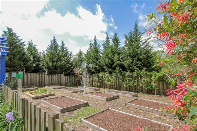 2281 Osburn Road Arrington, TN 37014 - Photo 18 of 20 a view of backyard with a table and chairs
