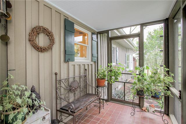 2281 Osburn Road Arrington, TN 37014 - Photo 5 of 20 a view of a porch with chairs and potted plants
