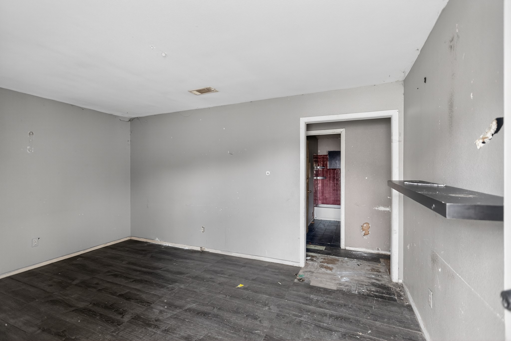 1003 Arthur Stiles Road Austin, TX 78721 - Photo 8 of 30 Ready for renovation, this blank canvas awaits your personal touch to create a modern living space.