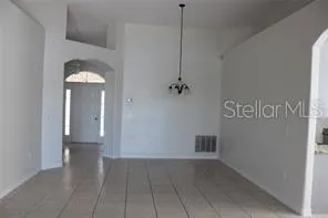 a view of a hallway with entryway