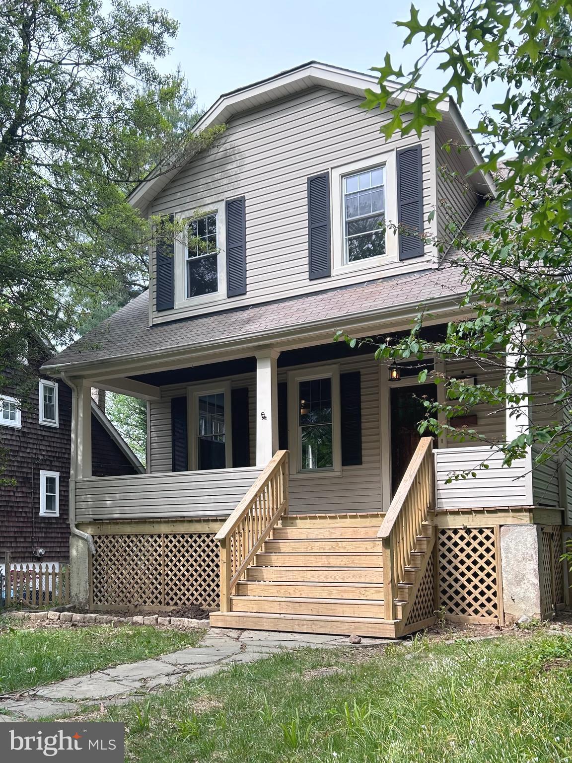 5108 Norwood Road Baltimore, MD 21212 - Photo 1 of 1 a front view of a house with a yard