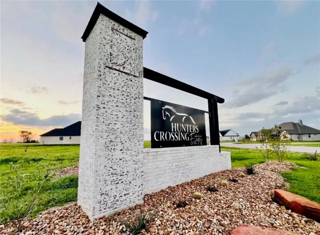 a view of a door front of a house with a yard