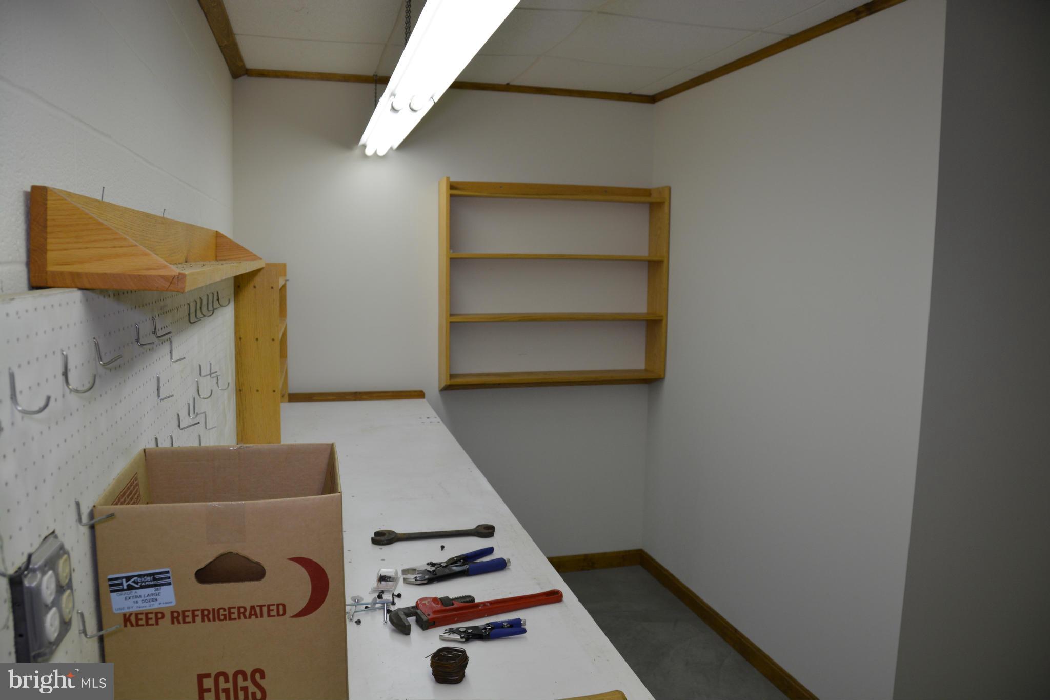 523 Sawlog Road Gore, VA 22637 - Photo 14 of 30 a room with a book shelf and a couch