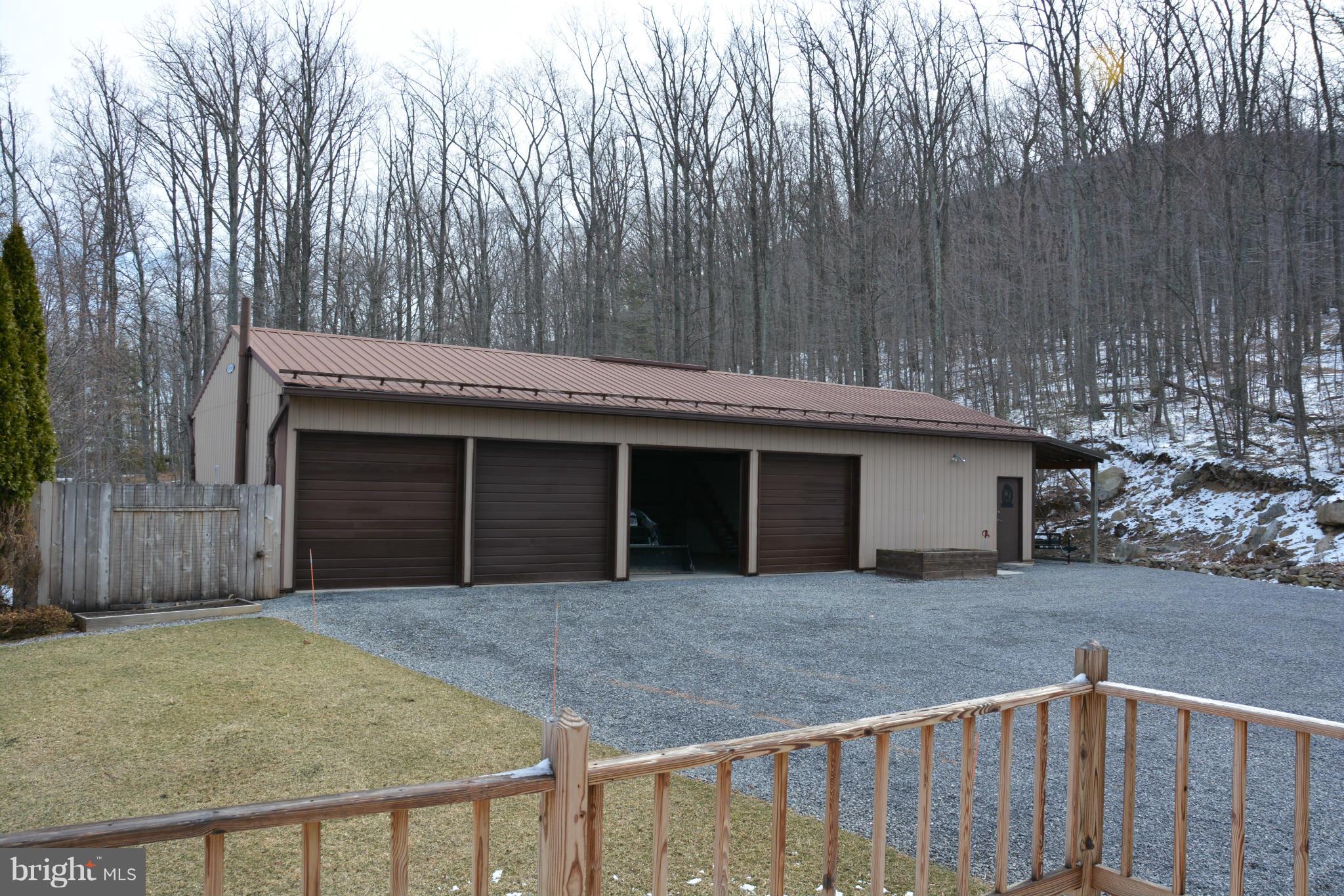 523 Sawlog Road Gore, VA 22637 - Photo 22 of 30 a front view of a house with a yard
