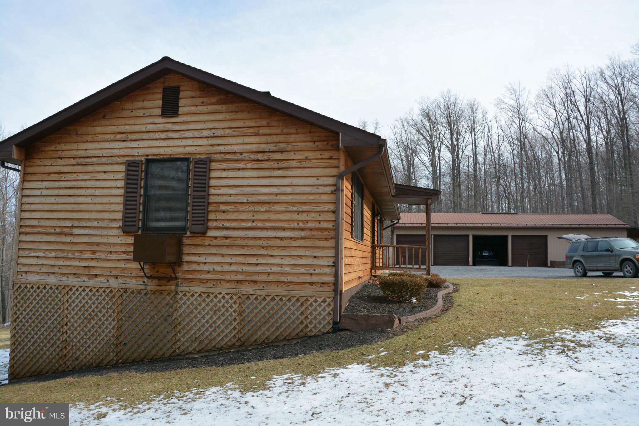 523 Sawlog Road Gore, VA 22637 - Photo 25 of 30 a front view of a house with a yard