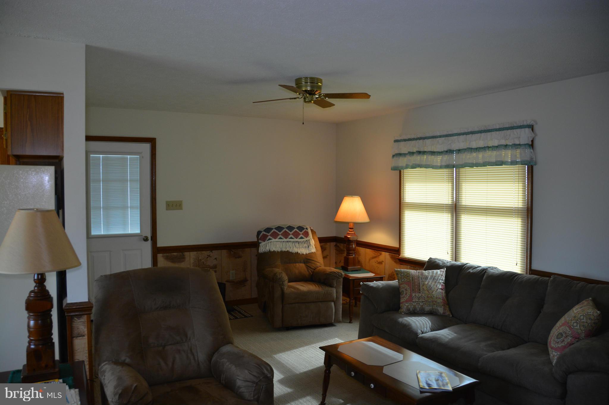 523 Sawlog Road Gore, VA 22637 - Photo 5 of 30 a living room with furniture and a window