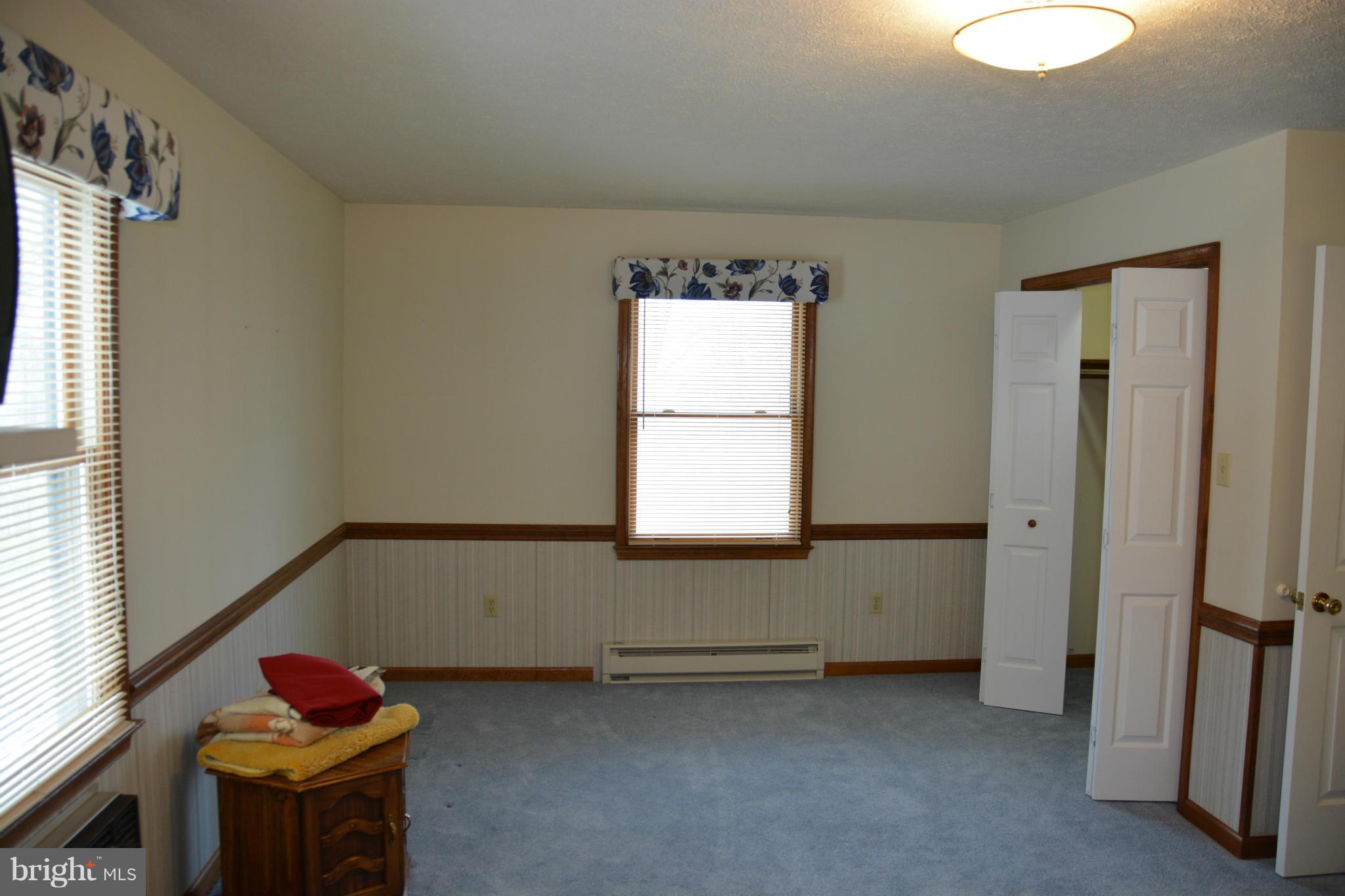 523 Sawlog Road Gore, VA 22637 - Photo 10 of 30 a living room with a rug