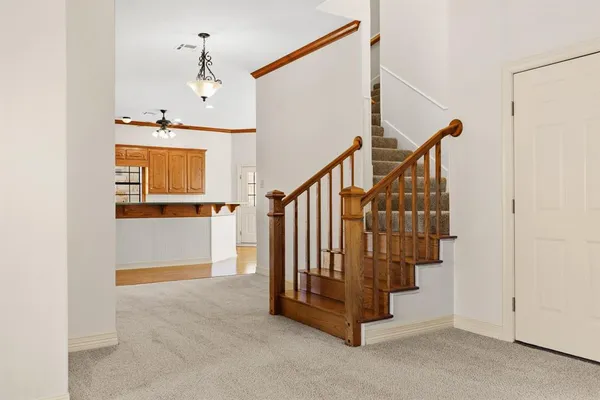 a view of entryway with wooden floor