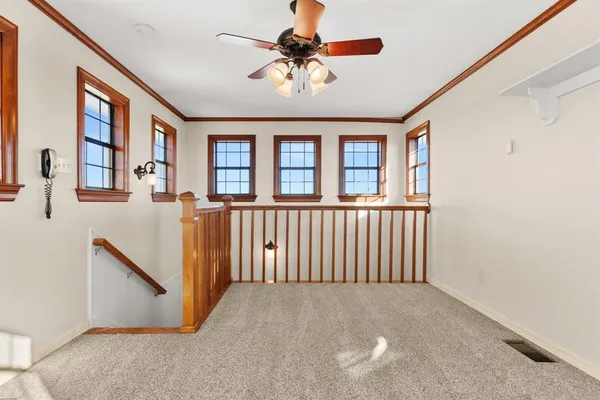 a view of a porch with furniture