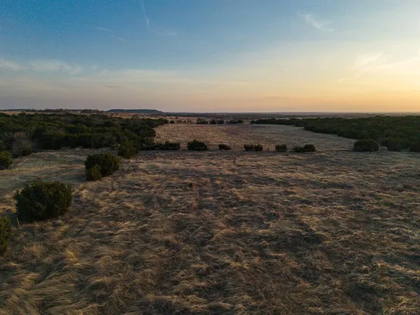 an aerial view of beach and ocean