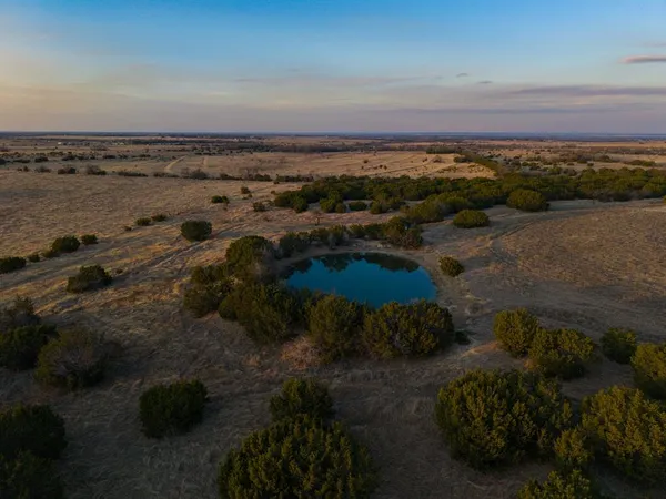 a view of a lake with a city