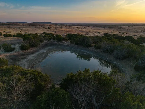 a view of a lake in a city