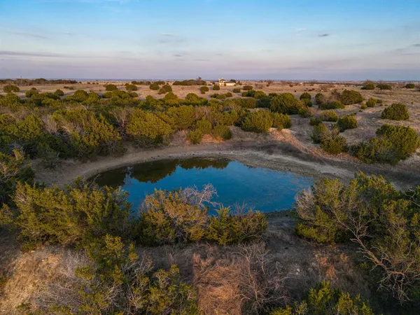 a view of lake and sunset