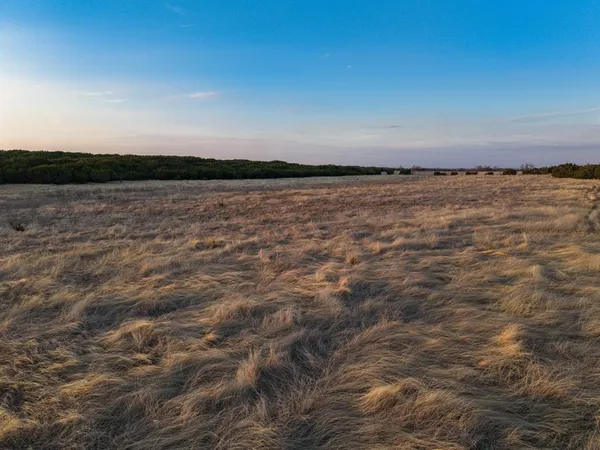 a view of lake with mountain in background